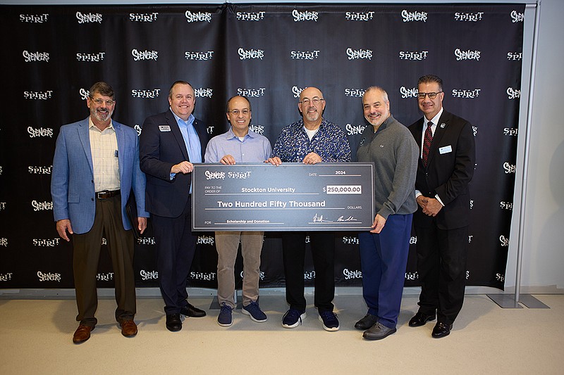 Provited/From left, Warren Kleinsmith, dean of Stockton’s School of Business; Dan Nugent, executive director of Stockton University Foundation; Isaac Silvera, Spencer's and Spirit Halloween president; Steven Silverstein, Spencer’s & Spirit Halloween CEO; Stockton President Joe Bertolino and Stockton Provost Michael Palladino.