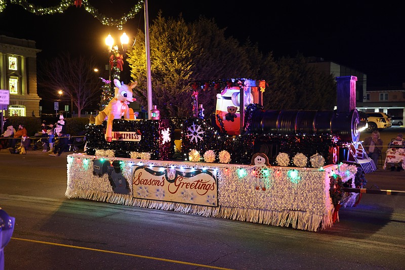 The colorful Polar Express float glides down Asbury Avenue.