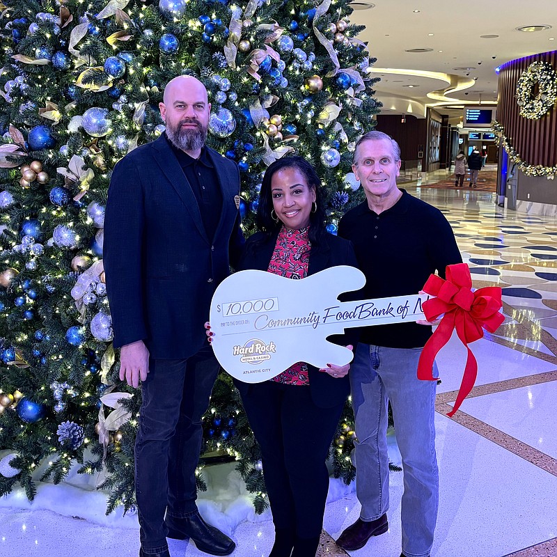Hard Rock Atlantic City Vice President of Marketing & Entertainment Mike Woodside, Director External Affairs of CFBNJ Torrina Bennett-Michael and Hard Rock Atlantic City President George Goldhoff