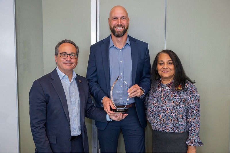 ACUA President Matthew DeNafo, center, at College of Engineering annual Alumni Awards, at Rowan and Engineering Halls, Glassboro, Nov. 2, 2024.