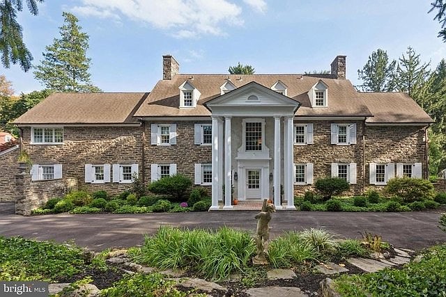 6900 Wissahickon Avenue: This historic 7-bedroom estate, designed by Robert McGoodwin in 1900, features timeless architecture, modern updates, and lush gardens on nearly an acre in West Mount Airy.