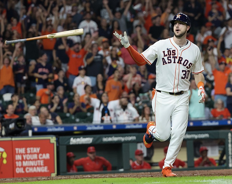 Sep 21, 2024; Houston, Texas, USA; Houston Astros right fielder Kyle Tucker (30) flicks his bat after hitting a home run against the Los Angeles Angels  in the seventh inning at Minute Maid Park. Mandatory Credit: Thomas Shea-Imagn Images