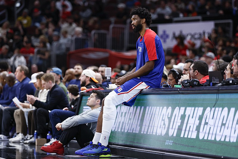 Dec 8, 2024; Chicago, Illinois, USA; Philadelphia 76ers center Joel Embiid (21) waits to enter the game against the Chicago Bulls during the first half at United Center. Mandatory Credit: Kamil Krzaczynski-Imagn Images