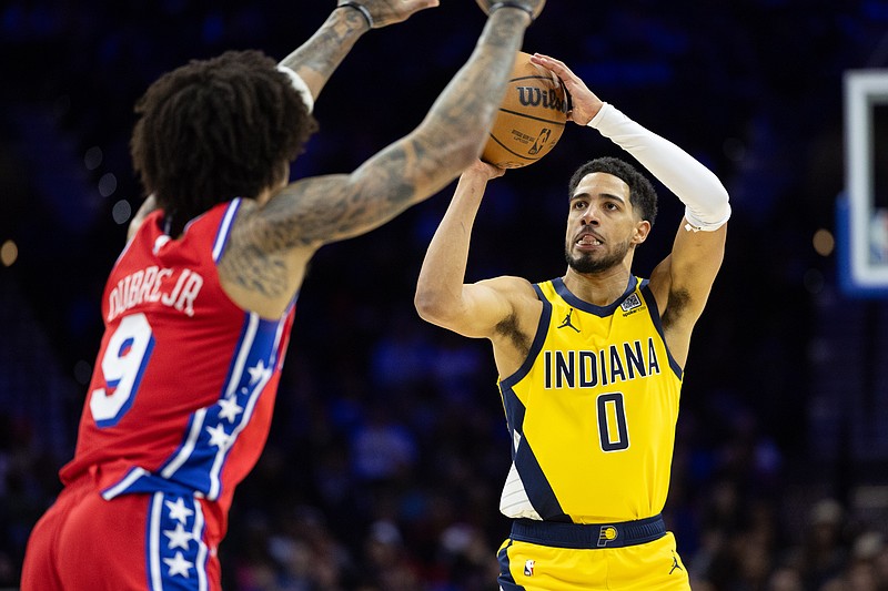 Dec 13, 2024; Philadelphia, Pennsylvania, USA; Indiana Pacers guard Tyrese Haliburton (0) shoots the bal in front of Philadelphia 76ers guard Kelly Oubre Jr. (9) during the second quarter at Wells Fargo Center. Mandatory Credit: Bill Streicher-Imagn Images