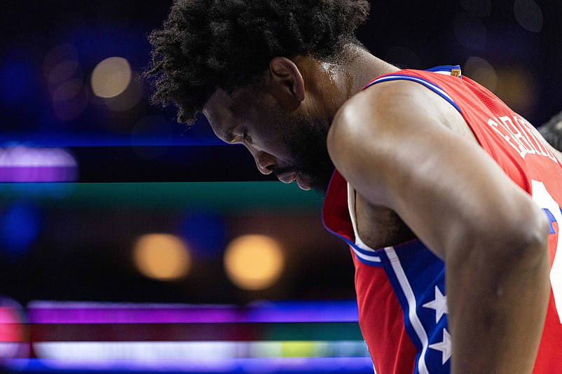 Dec 13, 2024; Philadelphia, Pennsylvania, USA; Philadelphia 76ers center Joel Embiid (21) looks on during a break in action in the first quarter against the Indiana Pacers at Wells Fargo Center. Mandatory Credit: Bill Streicher-Imagn Images