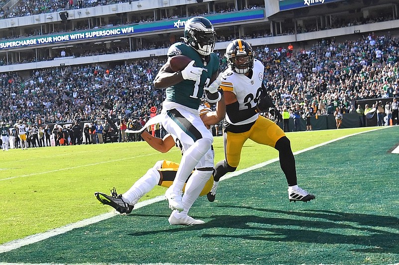 Oct 30, 2022; Philadelphia, Pennsylvania, USA; Philadelphia Eagles wide receiver A.J. Brown (11) catches 29-yard touchdown pass against Pittsburgh Steelers cornerback Ahkello Witherspoon (25) and safety Minkah Fitzpatrick (39) during the second quarter at Lincoln Financial Field. Mandatory Credit: Eric Hartline-USA TODAY Sports