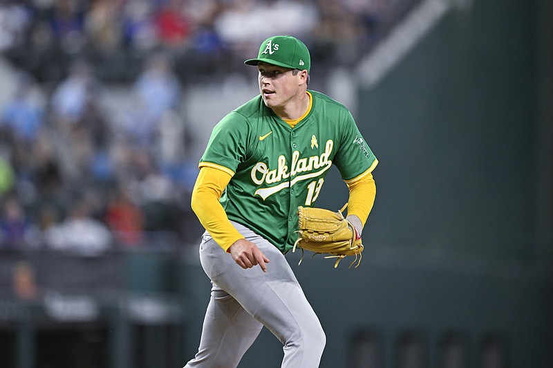 Sep 1, 2024; Arlington, Texas, USA; Oakland Athletics relief pitcher Mason Miller (19) pitches against the Texas Rangers during the tenth inning at Globe Life Field. Mandatory Credit: Jerome Miron-USA TODAY Sports