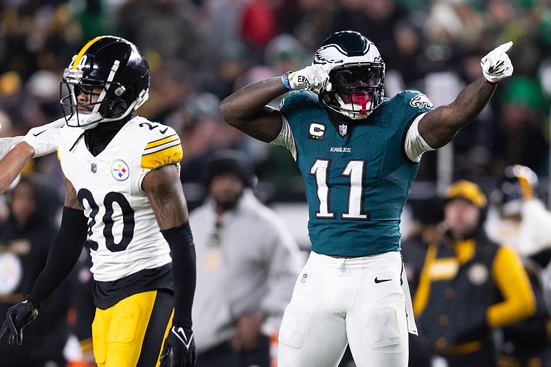 Dec 15, 2024; Philadelphia, Pennsylvania, USA; Philadelphia Eagles wide receiver A.J. Brown (11) reacts in front of Pittsburgh Steelers cornerback Cameron Sutton (20) after his first down catch during the second quarter at Lincoln Financial Field. Mandatory Credit: Bill Streicher-Imagn Images