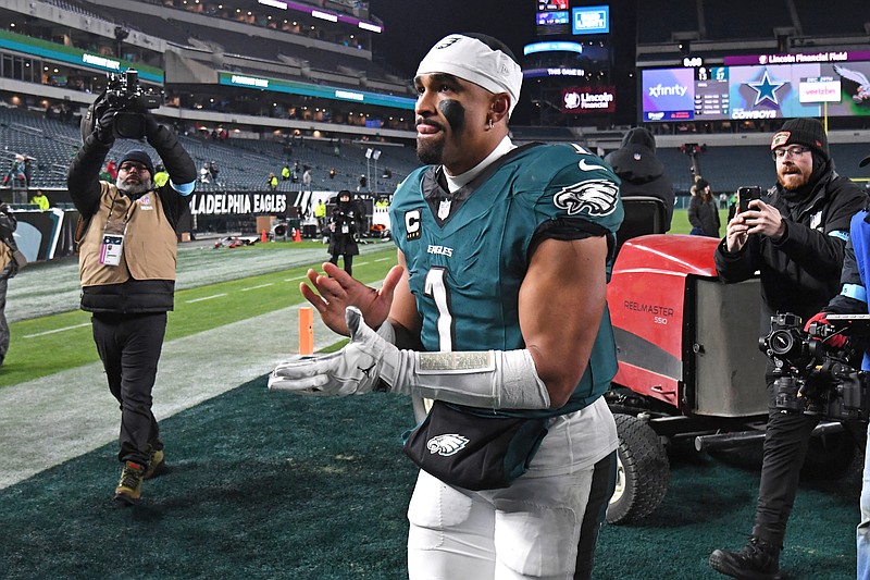 Dec 15, 2024; Philadelphia, Pennsylvania, USA; Philadelphia Eagles quarterback Jalen Hurts (1) runs off the field after win against the Pittsburgh Steelers Lincoln Financial Field. Mandatory Credit: Eric Hartline-Imagn Images