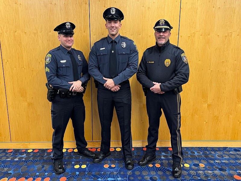 Officer Justin Thomas, center, was added to the Abington Police Force this week. (Image courtesy of ATPD)