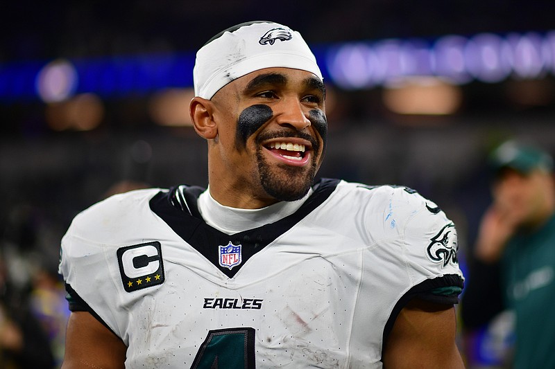 Nov 24, 2024; Inglewood, California, USA; Philadelphia Eagles quarterback Jalen Hurts (1) reacts following the victory against the Los Angeles Rams at SoFi Stadium. Mandatory Credit: Gary A. Vasquez-Imagn Images