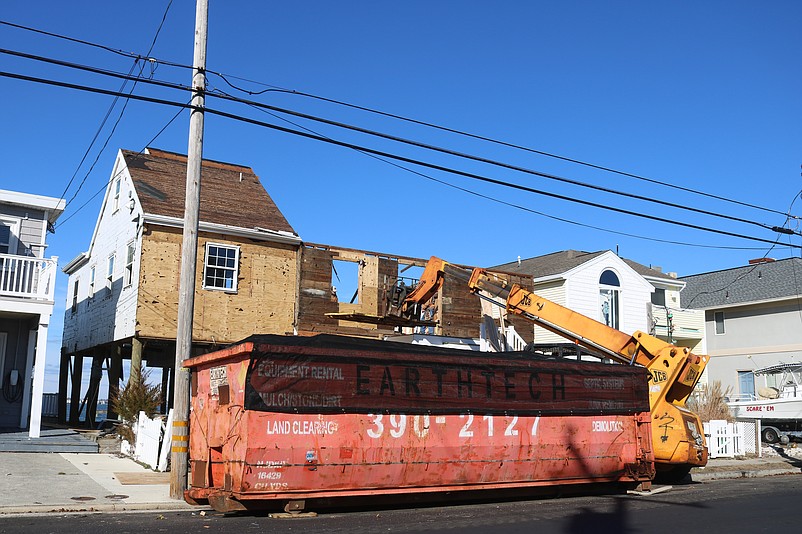 Big dumpsters like this one in front of a home construction project on Bay Avenue are a common sight in Ocean City.