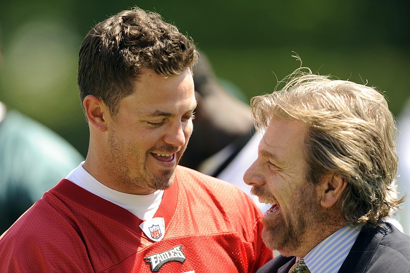 Apr 30, 2010; Philadelphia, PA, USA; Philadelphia Eagles quarterback Kevin Kolb (4) shares a laugh with local sports reporter Howard Eskin at the end of morning practice during mini-camp at the Philadelphia Eagles NovaCare Complex. Mandatory Credit: Howard Smith-USA TODAY Sports