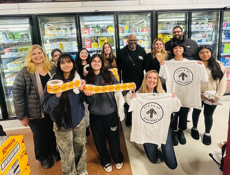 APR/Greater Atlantic Partnership members and Stand Up and REBEL student leaders took part in the Sticker Shock campaign at Passion Vines in Egg Harbor Township.