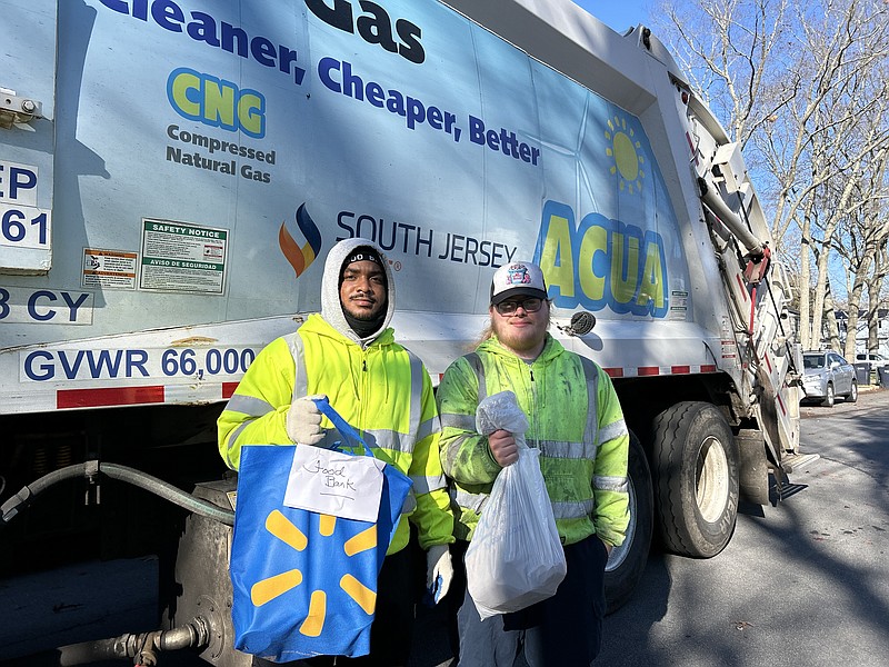 ACUA/Kevin Adams and Nasir Scott collect food for the Community FoodBank of NJ Southern Branch.