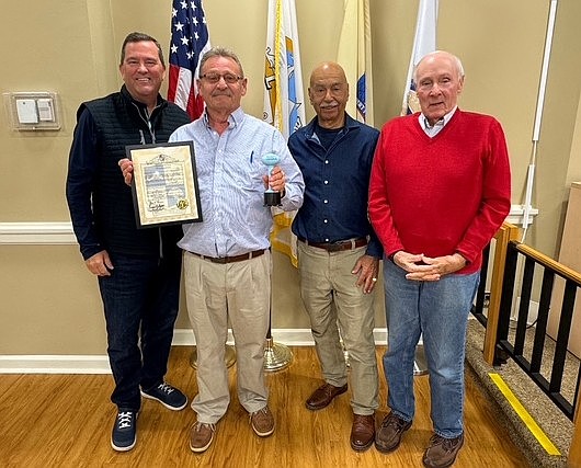 From left, Longport Commissioner Dan Lawler, Ruergen Simmons, Mayor Nicholas Russo and Commissioner Jim Leeds.