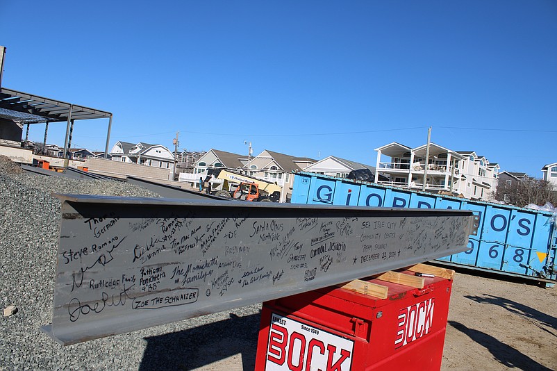 All of the space on the steel beam is taken up by the signatures of Sea Isle officials and residents.