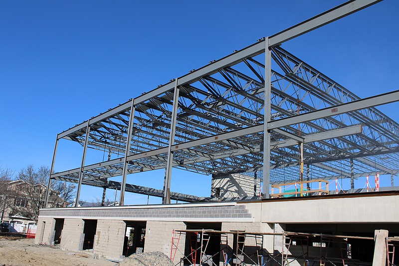 The community center's steel superstructure looms over Park Road and 46th Street.