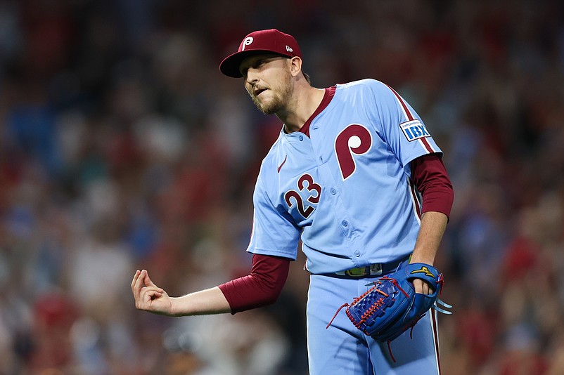 Aug 29, 2024; Philadelphia, Pennsylvania, USA; Philadelphia Phillies pitcher Jeff Hoffman (23) snaps his fingers in reaction to the final out in a victory against the Atlanta Braves at Citizens Bank Park. Mandatory Credit: Bill Streicher-USA TODAY Sports