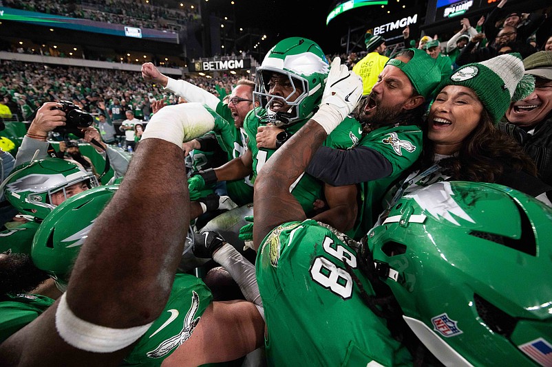 Nov 3, 2024; Philadelphia, Pennsylvania, USA; Philadelphia Eagles linebacker Nakobe Dean (17) celebrates with teammates and fans after an interception late in the fourth quarter against the Jacksonville Jaguars at Lincoln Financial Field. Mandatory Credit: Bill Streicher-Imagn Images