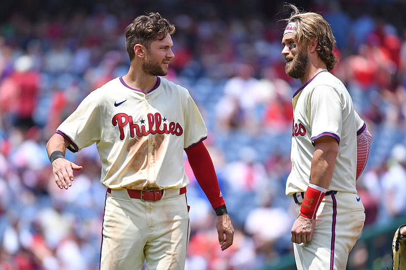 Jun 23, 2024; Philadelphia, Pennsylvania, USA; Philadelphia Phillies shortstop Trea Turner (7) and first base Bryce Harper (3) against the Arizona Diamondbacks at Citizens Bank Park. Mandatory Credit: Eric Hartline-USA TODAY Sports