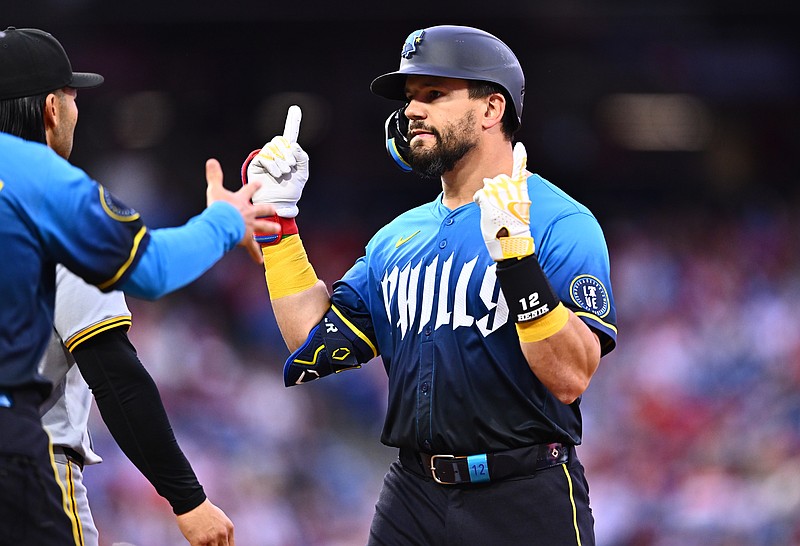 Apr 12, 2024; Philadelphia, Pennsylvania, USA; Philadelphia Phillies designated hitter Kyle Schwarber (12) reacts after hitting a single against the Pittsburgh Pirates in the first inning at Citizens Bank Park. Mandatory Credit: Kyle Ross-USA TODAY Sports