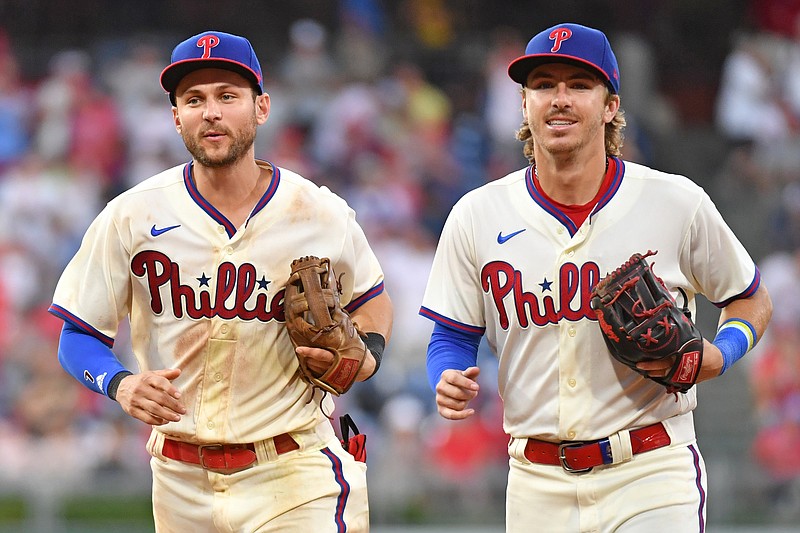 Jul 16, 2023; Philadelphia, Pennsylvania, USA; Philadelphia Phillies shortstop Trea Turner (7) and second baseman Bryson Stott (5) against the San Diego Padres at Citizens Bank Park. Mandatory Credit: Eric Hartline-USA TODAY Sports