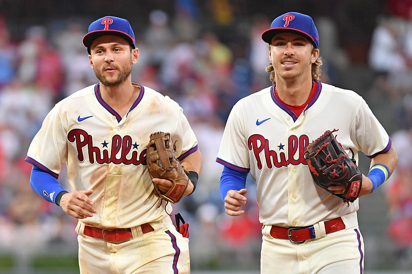 Jul 16, 2023; Philadelphia, Pennsylvania, USA; Philadelphia Phillies shortstop Trea Turner (7) and second baseman Bryson Stott (5) against the San Diego Padres at Citizens Bank Park. Mandatory Credit: Eric Hartline-USA TODAY Sports