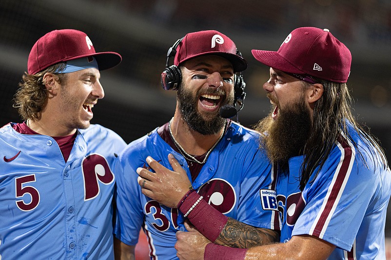 Aug 15, 2024; Philadelphia, Pennsylvania, USA; Philadelphia Phillies outfielder Weston Wilson (37) celebrates with outfielder Brandon Marsh (16) and second base Bryson Stott (5) after hitting for the cycle in a victory against the Washington Nationals at Citizens Bank Park. Mandatory Credit: Bill Streicher-USA TODAY Sports