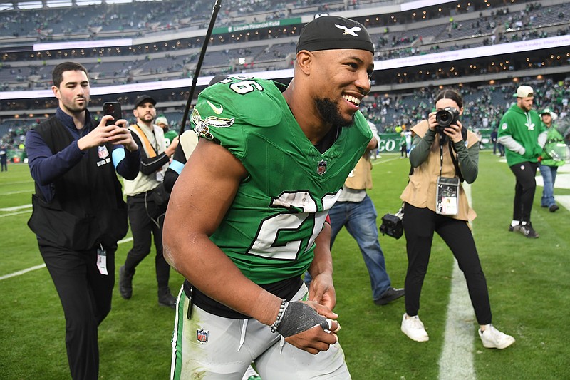 Dec 29, 2024; Philadelphia, Pennsylvania, USA; Philadelphia Eagles running back Saquon Barkley (26) runs off the field after win against the Dallas Cowboys at Lincoln Financial Field. Mandatory Credit: Eric Hartline-Imagn Images