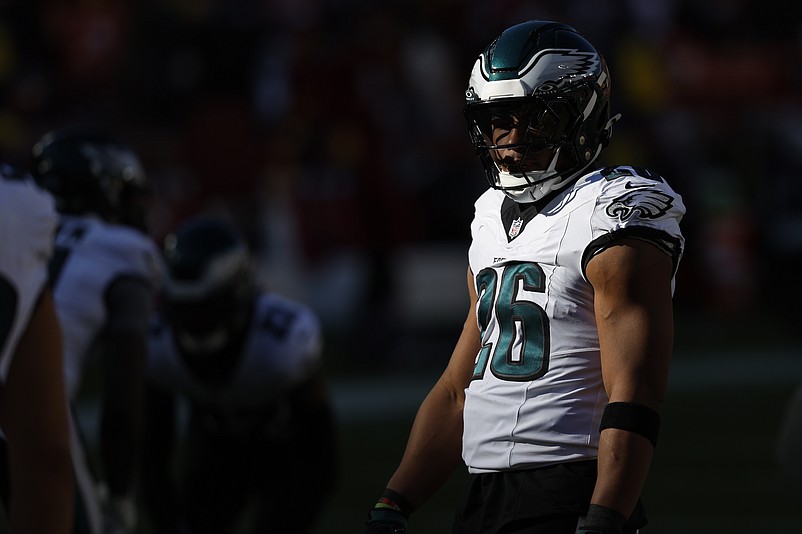 Dec 22, 2024; Landover, Maryland, USA; Philadelphia Eagles running back Saquon Barkley (26) stands on the field during warmup prior to the game against the Washington Commanders at Northwest Stadium. Mandatory Credit: Geoff Burke-Imagn Images