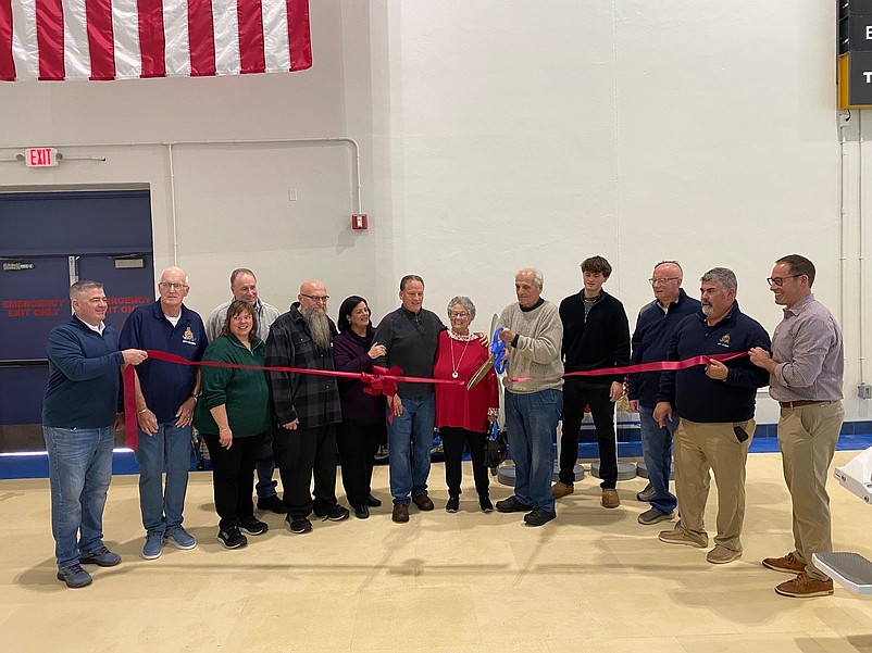 Members of the Mazzitelli family and City Council make the ceremony official with a ribbon cutting. (Courtesy of Ocean City)