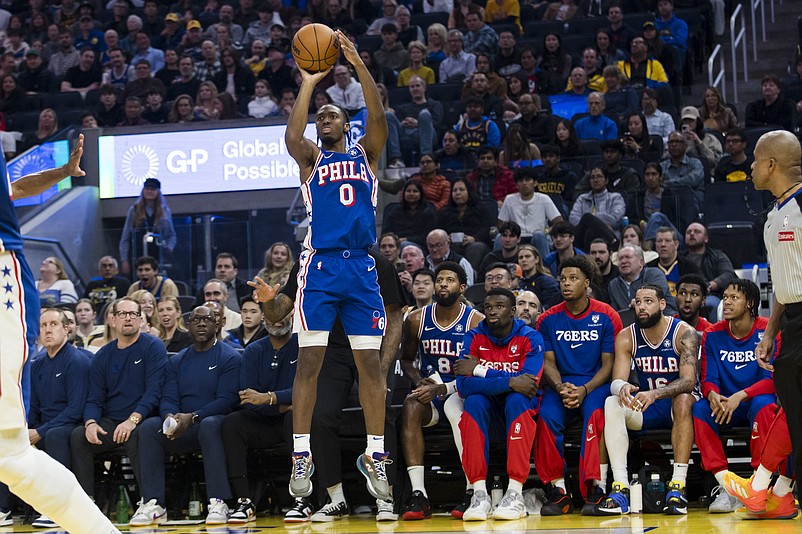 Jan 2, 2025; San Francisco, California, USA; Philadelphia 76ers guard Tyrese Maxey (0) takes a three-point shot against the Golden State Warriors during the first quarter at Chase Center. Mandatory Credit: John Hefti-Imagn Images