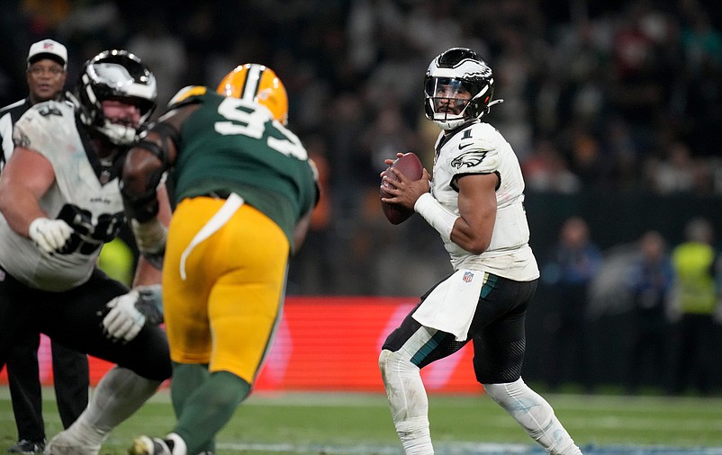 Sep 6, 2024; Sao Paulo, BRA; Philadelphia Eagles quarterback Jalen Hurts (1) drops to throw during the first half against the Green Bay Packers at Neo Quimica Arena. Mandatory Credit: Kirby Lee-Imagn Images