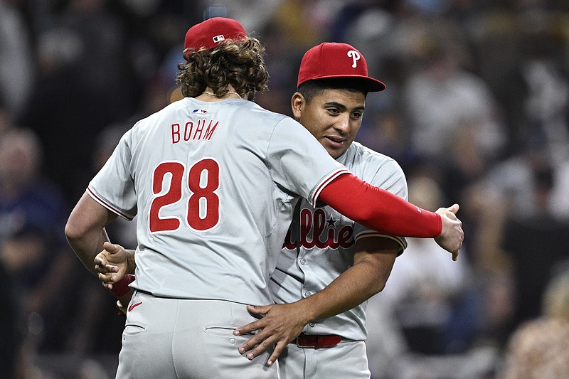 Apr 27, 2024; San Diego, California, USA; Philadelphia Phillies starting pitcher Ranger Suarez (55) and third baseman Alec Bohm (28) celebrate on the field after defeating the San Diego Padres at Petco Park. Mandatory Credit: Orlando Ramirez-USA TODAY Sports