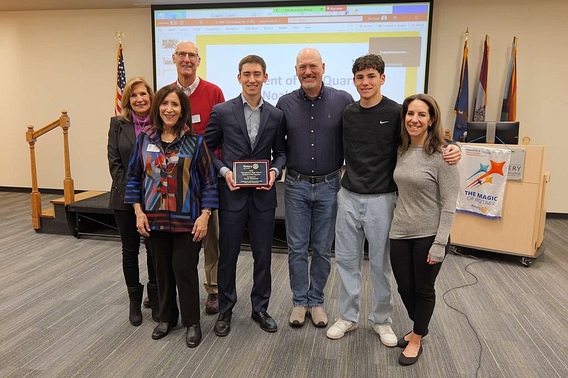 Noah Johnson, center, was recognized by the Blue Bell Rotary as student of the quarter for his hard work both in school and in the community. (Image courtesy of Wissahickon School District)