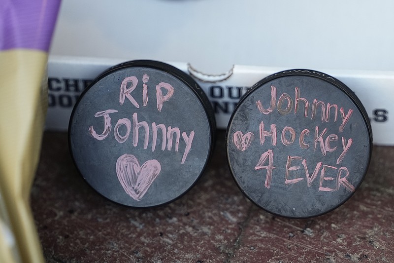 Aug 30, 2024; Columbus, OH, USA; A makeshift memorial grows outside Nationwide Arena for Columbus Blue Jackets forward Johnny Gaudreau. Gaudreau and his brother, Matthew, were killed in a bicycle accident the night before. Mandatory Credit: Adam Cairns/Columbus Dispatch-USA TODAY Network