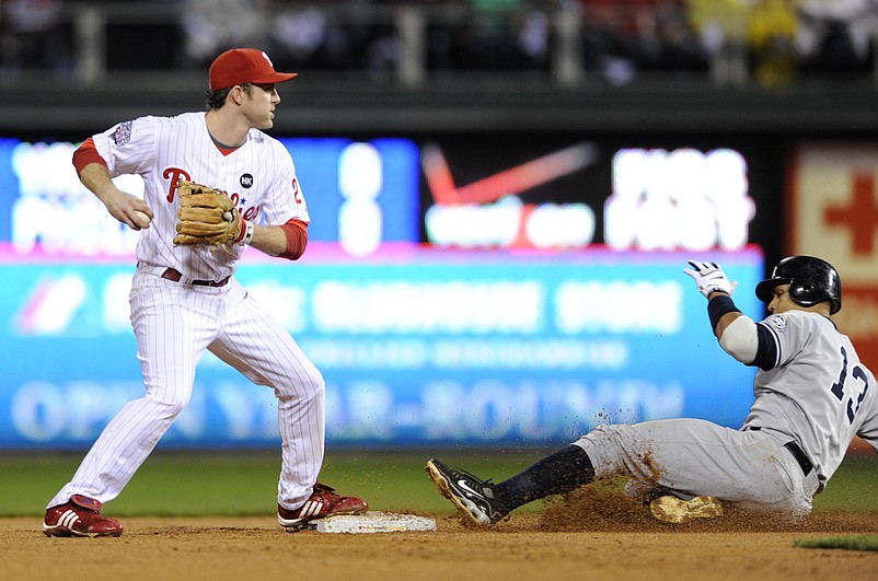 Oct 31, 2009; Philadelphia, PA, USA; New York Yankees third baseman Alex Rodriguez (13) is forced out by Philadelphia Phillies second baseman Chase Utley during the second inning of game three of the 2009 World Series at Citizens Bank Park.  Mandatory Credit: Howard Smith-USA TODAY Sports