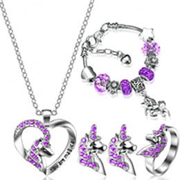 Examples of the recalled Yaomiao children’s necklace, ring, and bracelet jewelry sets that come inside a lavender box with “A Special Gift for the Charming You” printed on it. (Credit: PADOH)