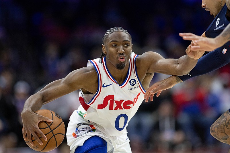 Jan 8, 2025; Philadelphia, Pennsylvania, USA; Philadelphia 76ers guard Tyrese Maxey (0) controls the ball against the Washington Wizards during the fourth quarter at Wells Fargo Center. Mandatory Credit: Bill Streicher-Imagn Images