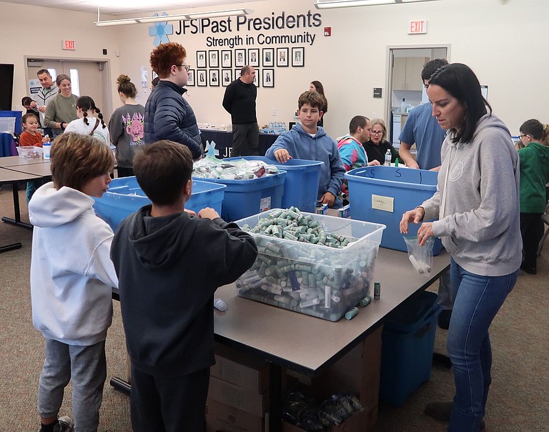 JFS/Jewish Family Service of Atlantic & Cape May Counties volunteers assemble bags of personal hygiene products for people in need in the community at the Martin Luther King, Jr. Day of Service program in 2024.