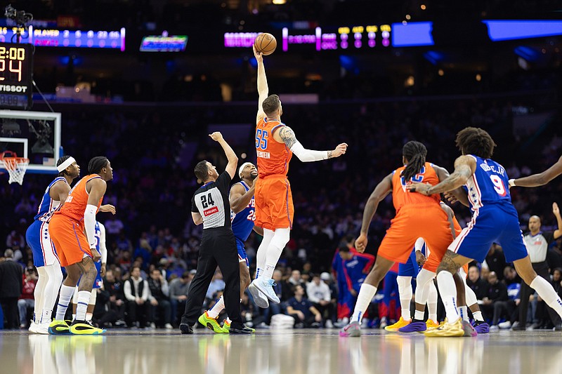 Jan 14, 2025; Philadelphia, Pennsylvania, USA; Oklahoma City Thunder center Isaiah Hartenstein (55) tips off against Philadelphia 76ers forward Guerschon Yabusele (28) to start the first quarter at Wells Fargo Center. Mandatory Credit: Bill Streicher-Imagn Images