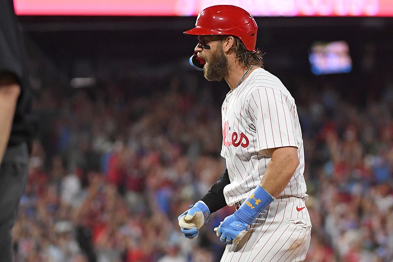 Aug 26, 2024; Philadelphia, Pennsylvania, USA; Philadelphia Phillies first base Bryce Harper (3) celebrates his walk-off single against the Houston Astros during the tenth inning at Citizens Bank Park. Mandatory Credit: Eric Hartline-USA TODAY Sports