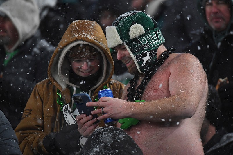 Jan 19, 2025; Philadelphia, Pennsylvania, USA; Philadelphia Eagles fans look on from the stands during the second half against the Los Angeles Rams in a 2025 NFC divisional round game at Lincoln Financial Field. Mandatory Credit: Eric Hartline-Imagn Images