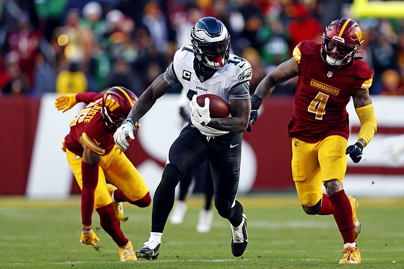 Dec 22, 2024; Landover, Maryland, USA; Philadelphia Eagles wide receiver A.J. Brown (11) runs the ball after a catch during the fourth quarter against the Washington Commanders at Northwest Stadium. Mandatory Credit: Peter Casey-Imagn Images