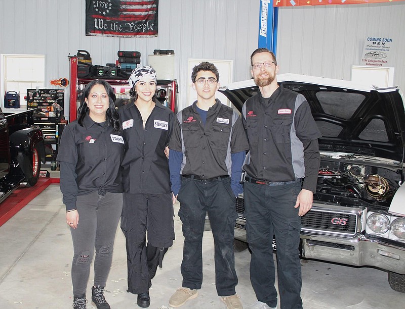 Owners Taj Davis, left, and Steve Davis, right, and family. (Credit: Randy Spaide)