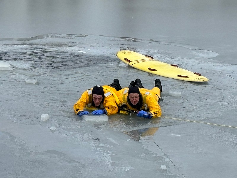 MCFD/Firefigthers practice ice rescue training.