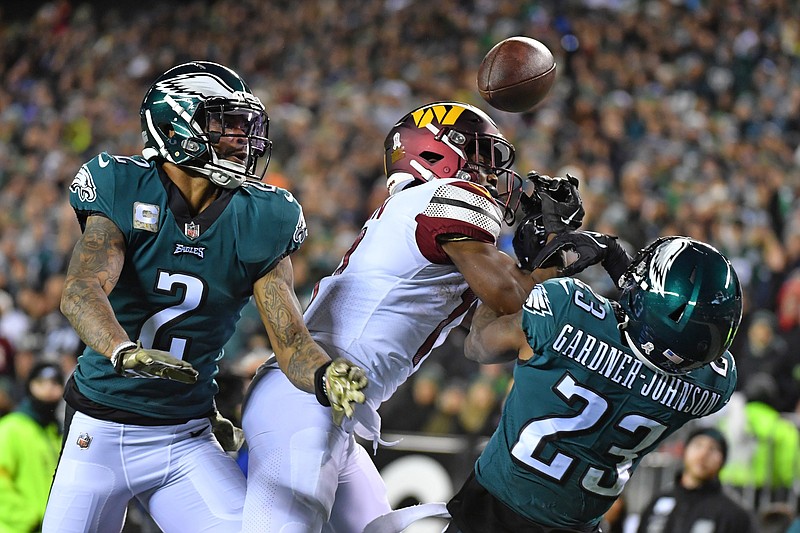 Nov 14, 2022; Philadelphia, Pennsylvania, USA; Philadelphia Eagles cornerback Darius Slay (2) and safety C.J. Gardner-Johnson (23) break up pass in the end zone for Washington Commanders wide receiver Terry McLaurin (17) during the second quarter at Lincoln Financial Field. Mandatory Credit: Eric Hartline-USA TODAY Sports