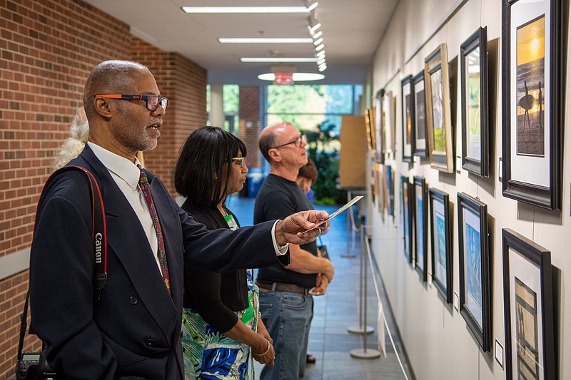 Art enthusiasts take in an exhibition at Bucks County Community College’s Epstein Campus at Lower Bucks. (Credit: BCCC)