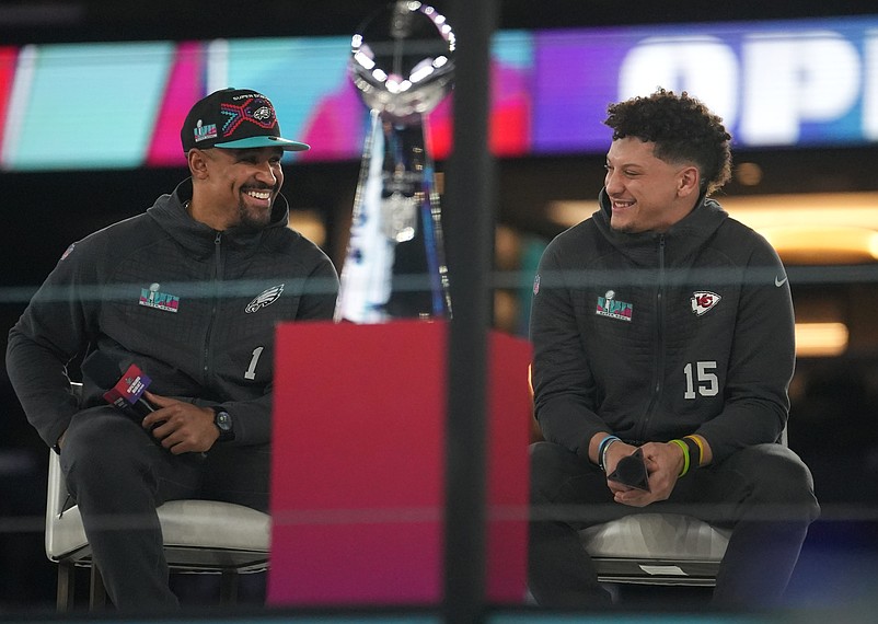 Kansas City Chiefs quarterback Patrick Mahomes, right, and Philadelphia Eagles quarterback Jalen Hurts, left, share the stage at the Footprint Center in downtown Phoenix during the NFL's Super Bowl opening night on Feb. 6, 2023...Nfl Super Bowl Opening Night At Footprint Center